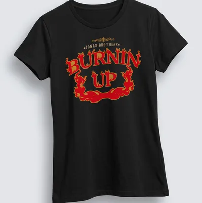 Bold retro print featuring flames and 'Jonas Brothers Burnin Up' text — printed on a women's shirt