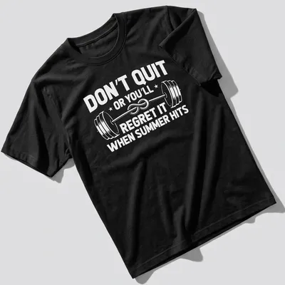 Bold typography t-shirt with the text 'Don't Quit or You'll End Up Like a Cucumber' for gym-goers