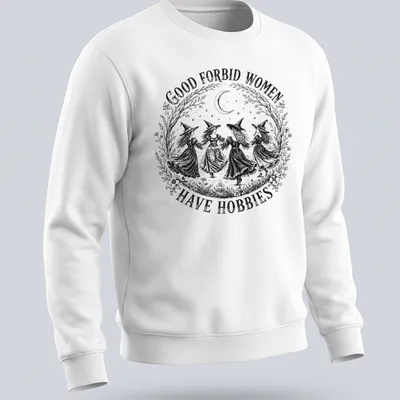 Vintage black and white shirt with witches and sarcastic text about hobbies. — printed on a unisex sweatshirt