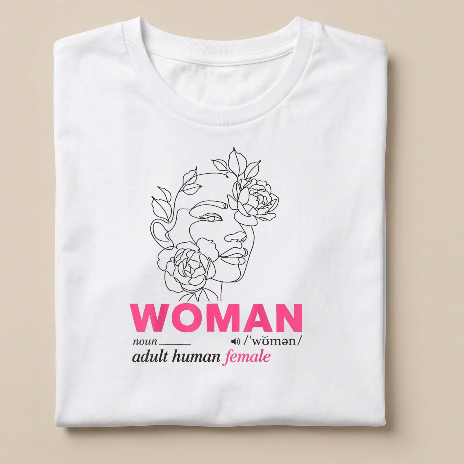 Floral woman face design surrounding the text defining 'woman' in line art style — printed on a unisex t-shirt