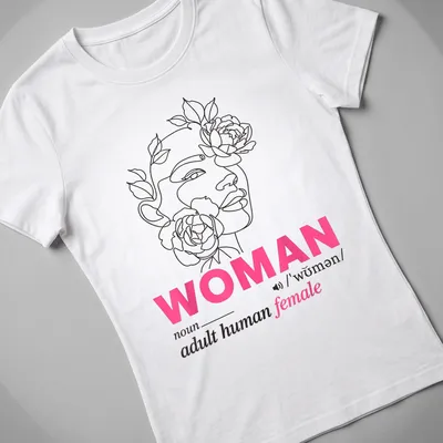 Floral woman face design surrounding the text defining 'woman' in line art style — printed on a women's shirt