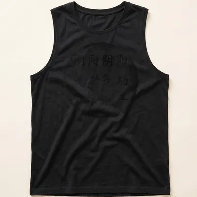 Distressed t-shirt featuring the Yin Yang symbol and Qigong text in black and white — printed on a tank top
