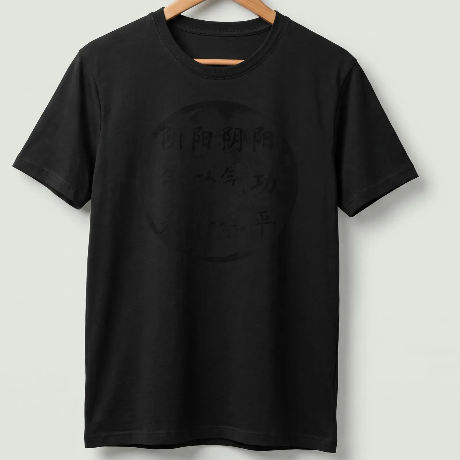 Distressed t-shirt featuring the Yin Yang symbol and Qigong text in black and white — printed on a unisex t-shirt